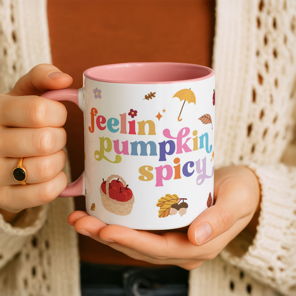 11oz Ceramic Mug Black - Rainbow text feelin pumpkin spicy with pumpkins and fall leaves