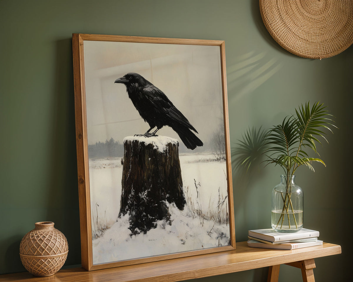 Framed crow poster displayed in a living room above a fireplace mantel with natural decor